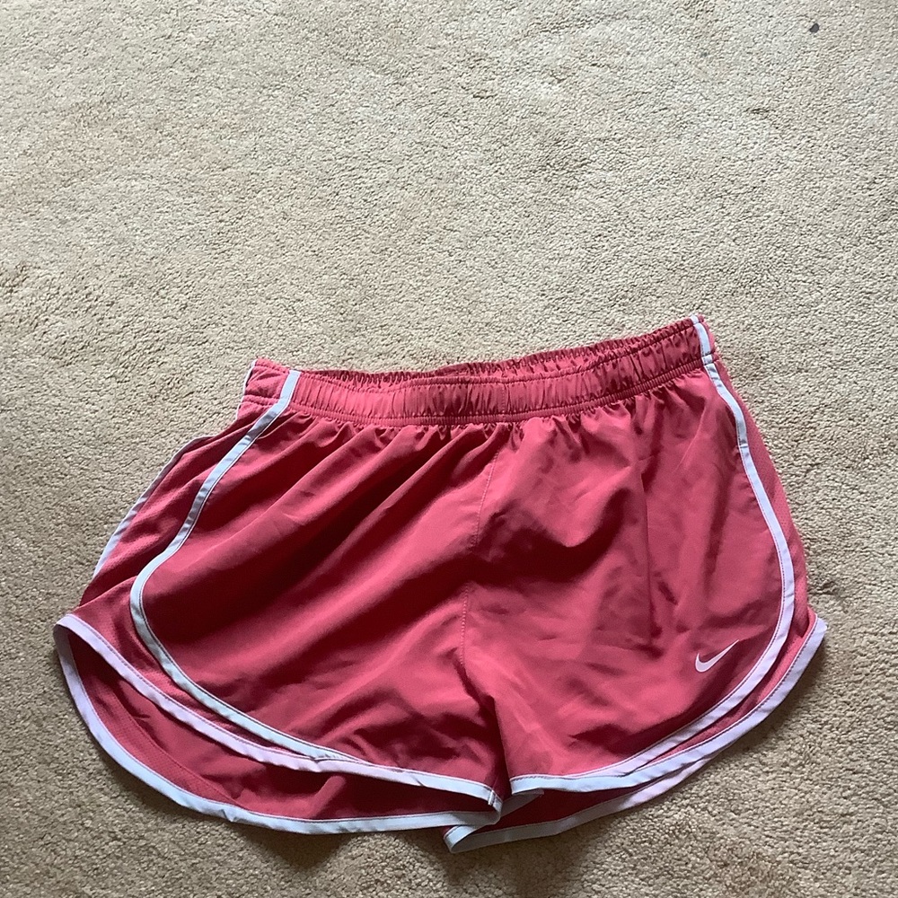 Nike running shorts in salmon